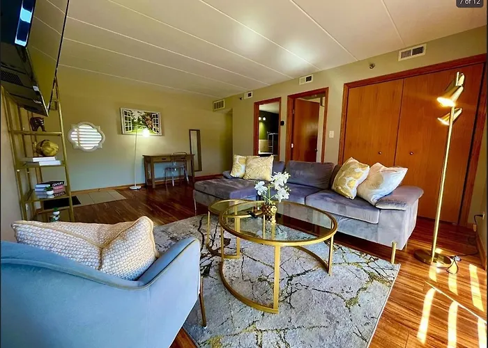 Modern 1-Bedroom Condo With Private Parking